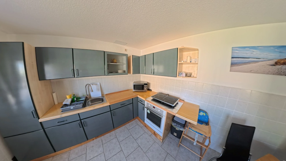 Voll ausgestattete Küche im Bungalow